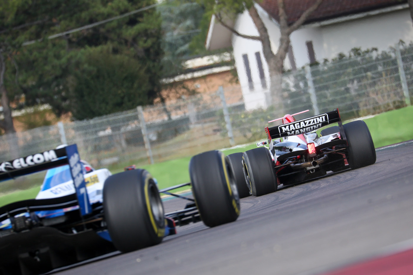 Stratford (Benetton F1) follows a MM International GP2 car