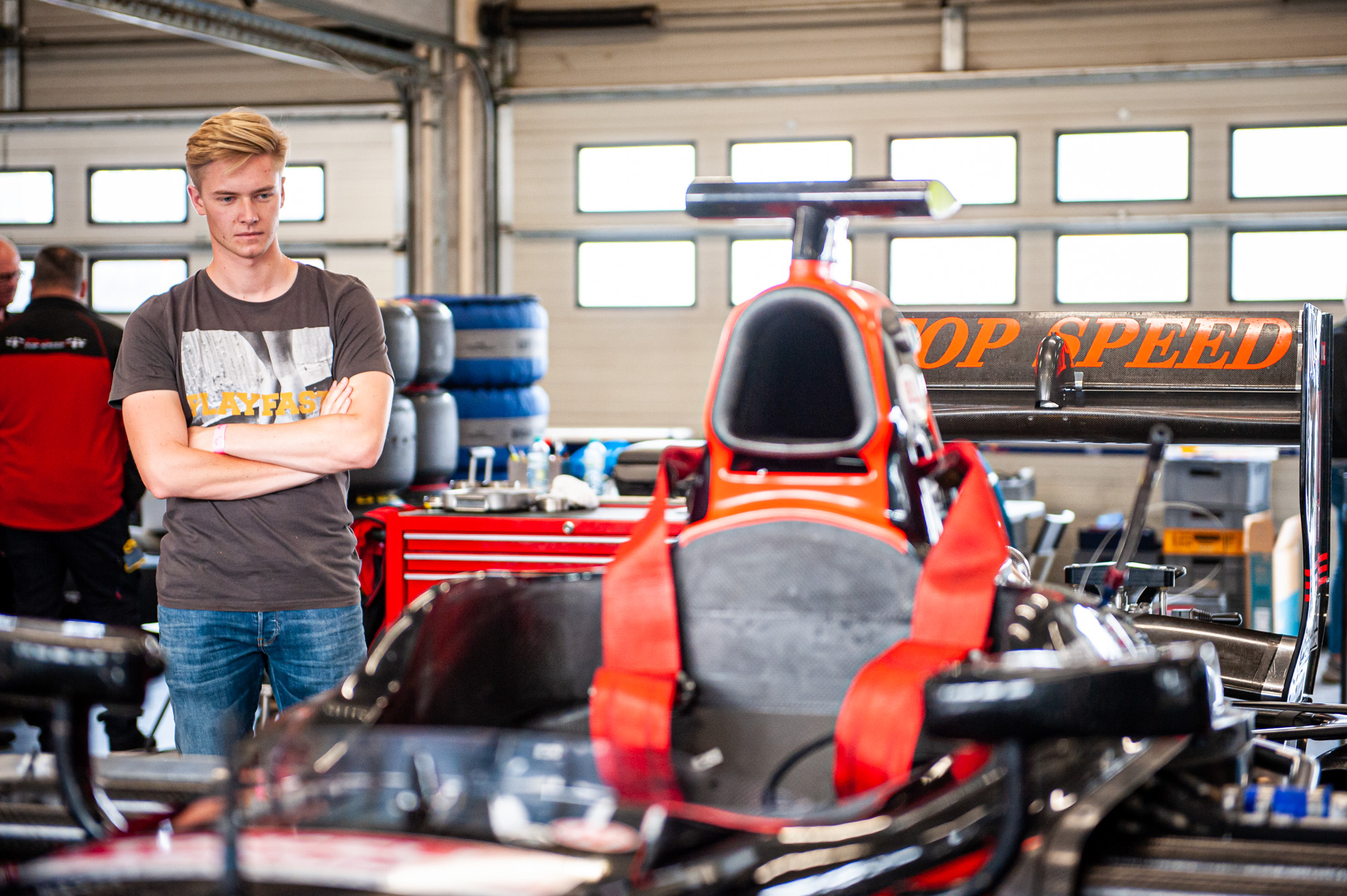 Chris Höher looks on his race car