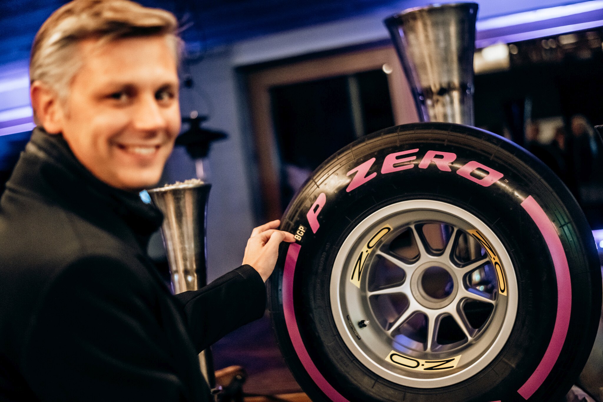 Matteo Braga from Pirelli with the 2020 BOSS GP tyre - Credit Michael Jurtin